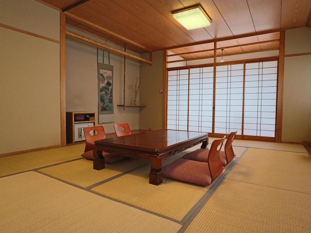 Ryokan Hikarinoie Юфу Экстерьер фото
