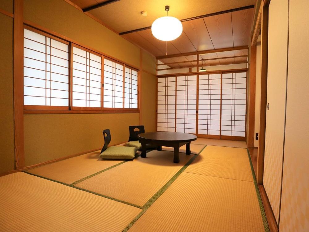 Ryokan Hikarinoie Юфу Экстерьер фото